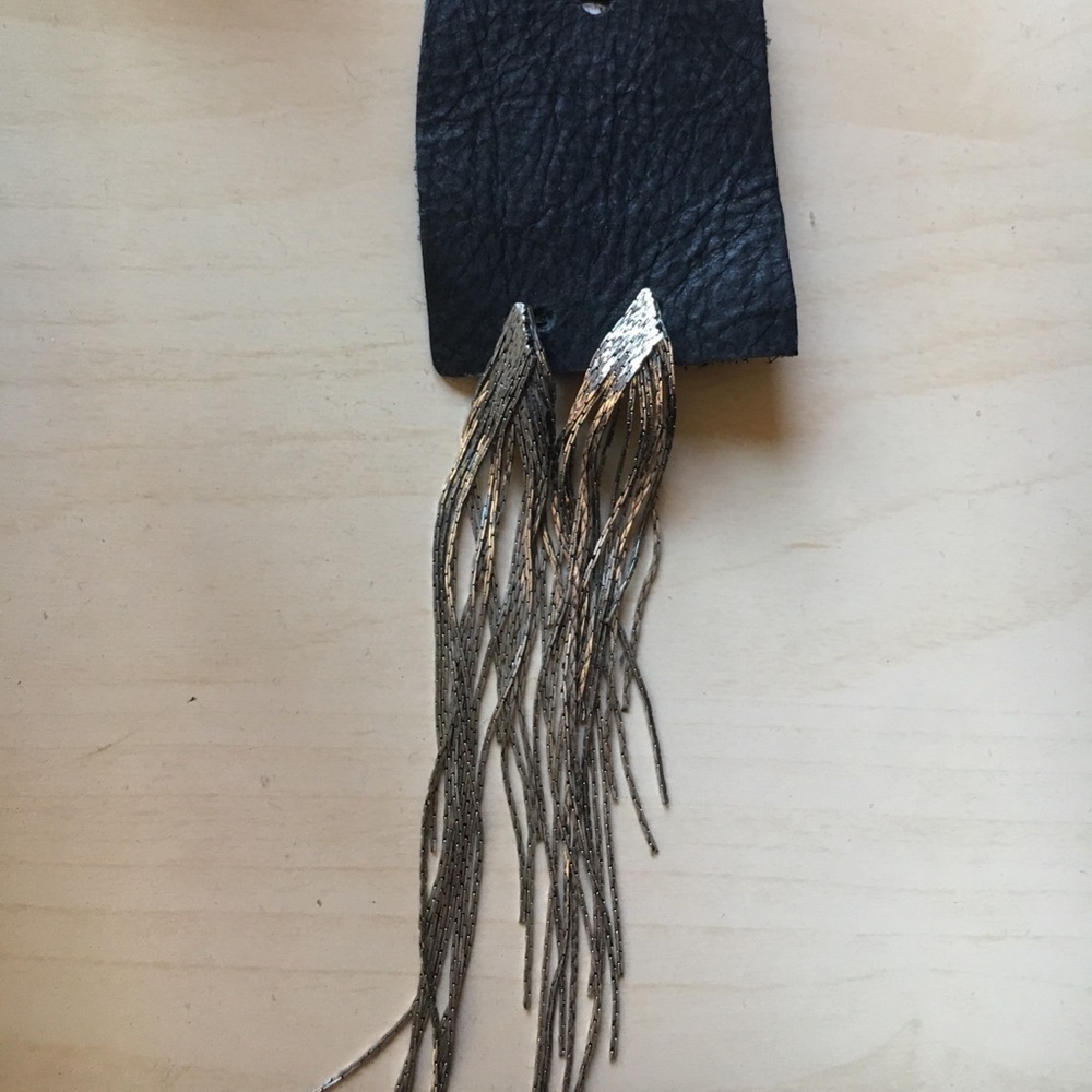Silver dangling earrings from UrbanOutfitters